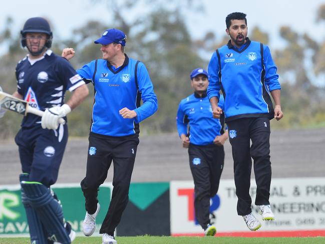 Sunam Gautam jumps for joy after snaring a wicket. Picture: Rob Leeson.