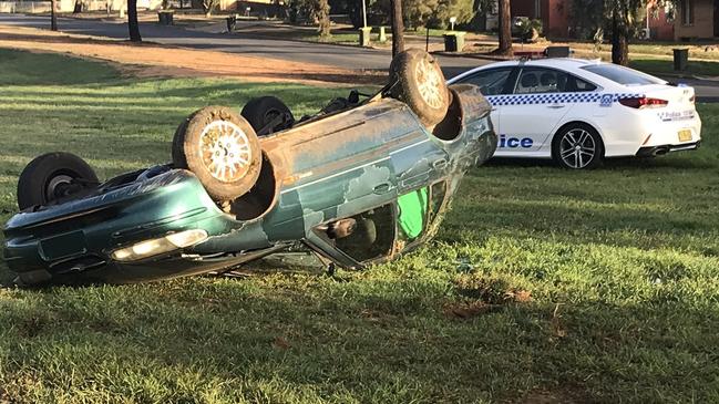 The green Ford Falcon that rolled on Wednesday morning after police pursued it in Ashmont because it had no number plates. Picture: Riverina Police District