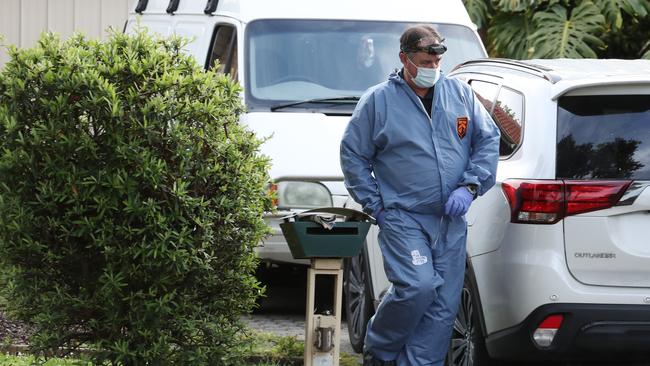 Police and forensics at the scene in Bayswater North. Picture: David Crosling