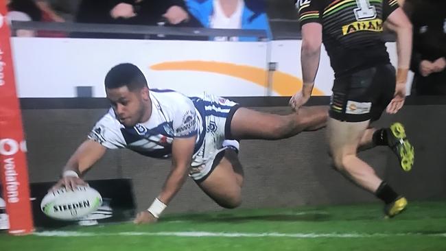 The video referee rules a try to New Zealand Warriors winger David Fusitua despite his left hand clearly touching the ground over the sideline in their NRL clash with the Penrith Panthers at Mt Smart Stadium.