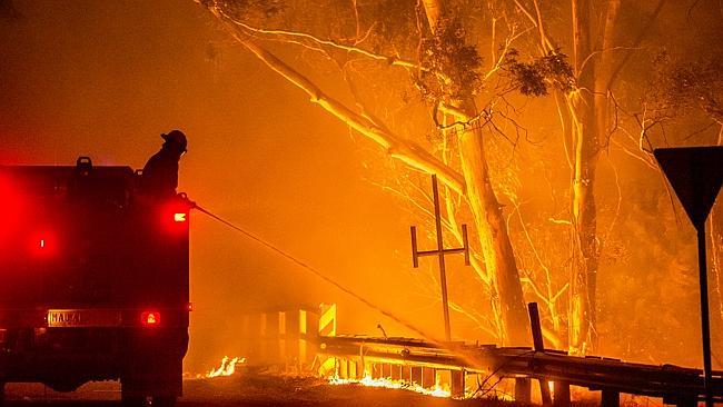 Firefighters fight the massive blaze at the industrial estate.