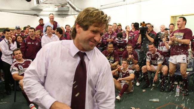 Des Hasler celebrates with his players after the 2008 grand final victory.