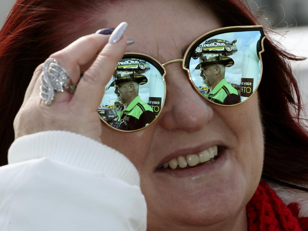 Annette Nayda from Gawler has her husband Darren and his racing hat in her sights. Picture SARAH REED