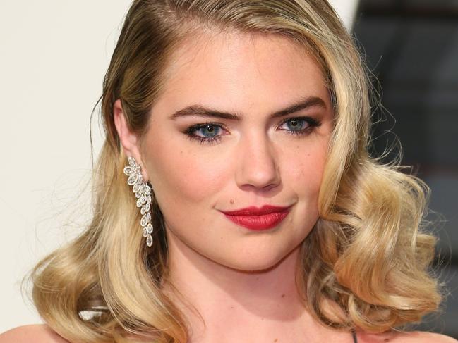 (FILES) In this file photo taken on February 26, 2017 US model and actress Kate Upton poses as she arrives to the Vanity Fair Party following the 88th Academy Awards at The Wallis Annenberg Center for the Performing Arts in Beverly Hills, California. Supermodel Kate Upton has accused fashion giant Guess's co-founder Paul Marciano of sexually harassing women. Upton, 25, did not cite a specific incident in her criticism January 31, 2018 of Guess co-founder and creative director Marciano, who is 65. Upton, who was once the face of Guess, became the latest star to add her voice to the global #MeToo campaign against sexual misconduct, that kicked off following accusations against Hollywood mogul Harvey Weinstein. / AFP PHOTO / JEAN-BAPTISTE LACROIX