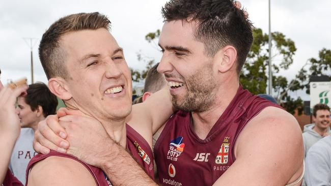 Jack Trengove (left) celebrates with Cameron Giles after winning the Adelaide Footy League division one grand final over Payneham Norwood Union. Picture: Brenton Edwards