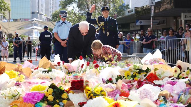 Floral tributes outside Westfield Bondi Junction grew steadily throughout the day. Picture: John Feder