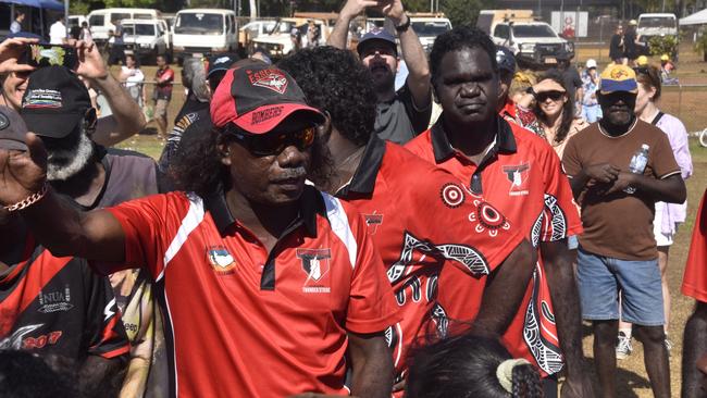 A Bombers coach speaking to his players before the last quarter in the Tiwi Island Football League grand final between Tuyu Buffaloes and Pumarali Thunder. Picture: Max Hatzoglou