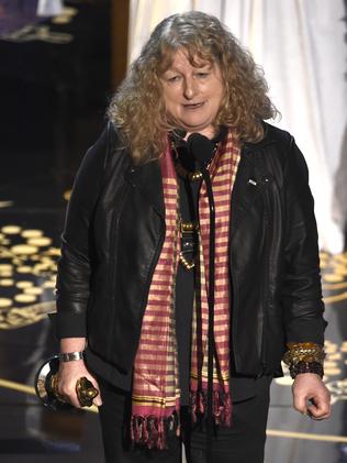 Jenny Beavan accepts the award for best costume design for “Mad Max: Fury Road”.