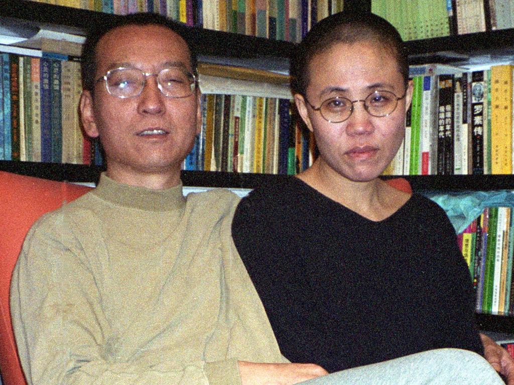 Chinese dissident and Nobel Peace laureate Liu Xiaobo (L) and his wife Liu Xia (R). Picture: AFP