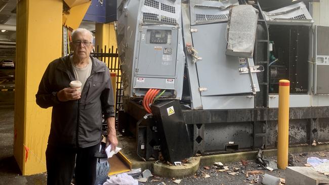 David Lenertz stands next to the busted generator on Monday morning after an appointment.