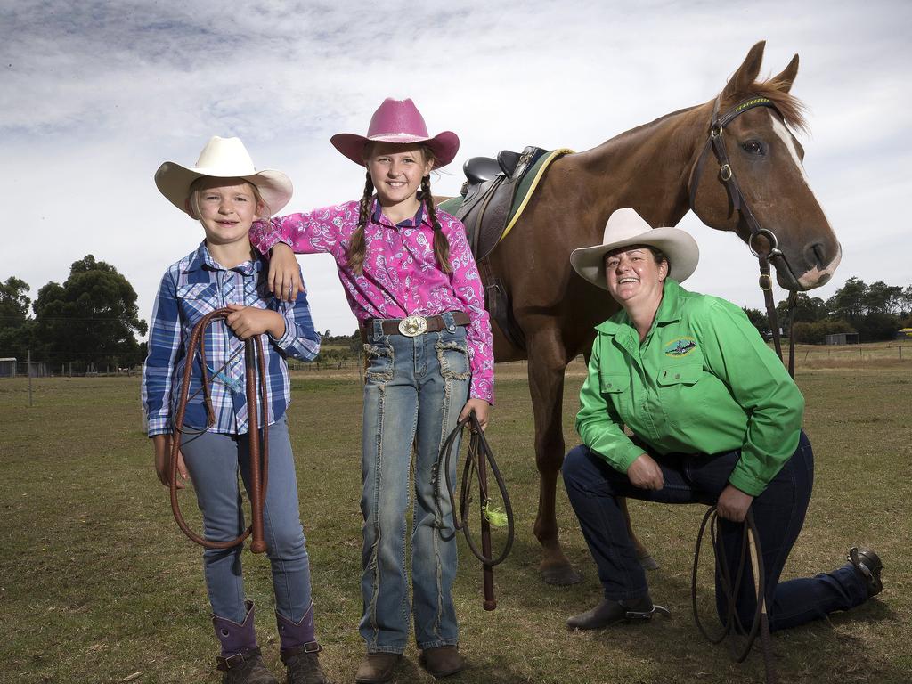 (L-R) Marli King, 8, left, Gemma King, 10, and Tanya King with Gold Rush, preparing for the Tasmanian Mountain Cattlemen’s Association annual Get Together at Harveydale. Picture: CHRIS KIDD