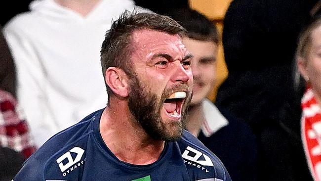 BRISBANE, AUSTRALIA - AUGUST 25: Kyle Feldt of the Cowboys celebrates after scoring a try during the round 26 NRL match between Dolphins and North Queensland Cowboys at Suncorp Stadium on August 25, 2023 in Brisbane, Australia. (Photo by Bradley Kanaris/Getty Images)