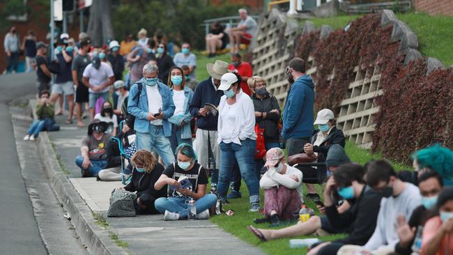 People line up for coronavirus tests at Wollongong Hospital, south of Sydney, on Wednesday. Picture: John Feder