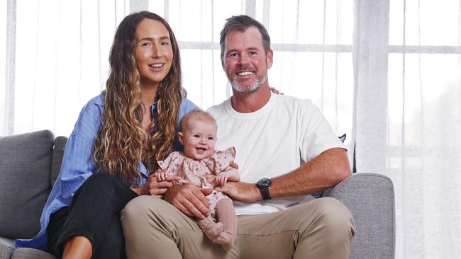 Indigenous cricketer Dan Christian and his partner Jorgia Dunn and daughter Harper at his Eastern Sydney home today. Picture: Sam Ruttyn