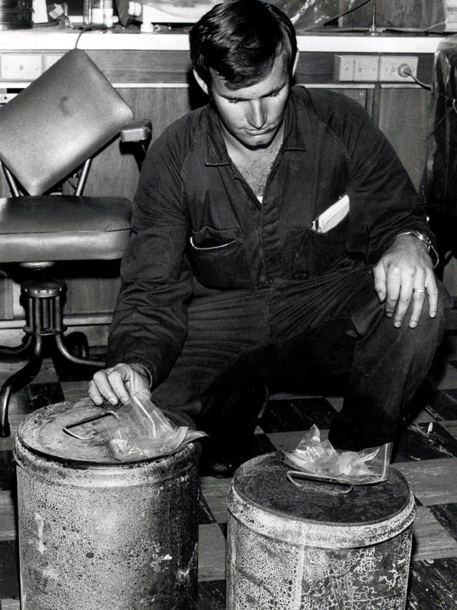 The two four gallon drums used to set the club on fire.