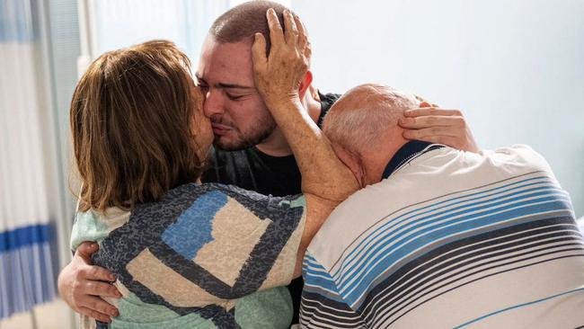 Almog Meir Jan, 22-years-old, being greeted by his close relatives at the Sheba Tel-HaShomer Medical Centre. Picture: AFP