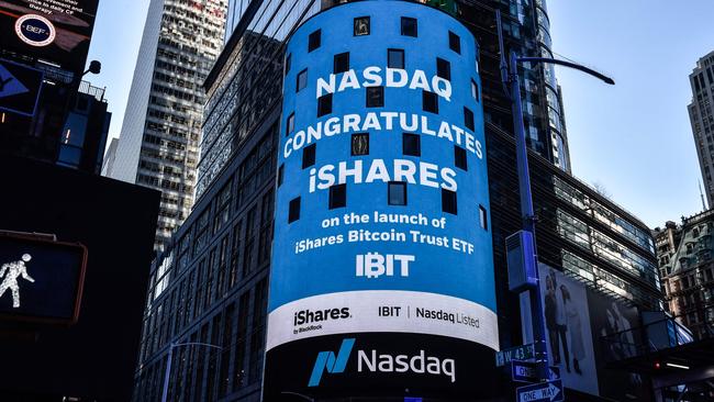 The Nasdaq board in Times Square displays a message as bitcoin spot ETFs are launched on the Nasdaq Exchange on January 11. Picture: Getty Images