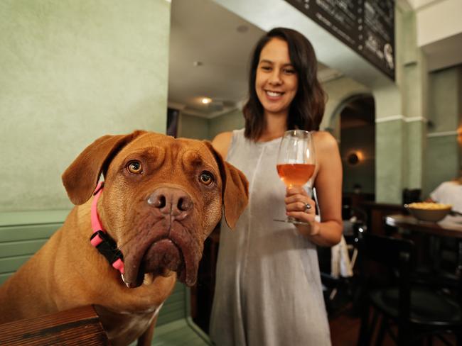 Kristi Burrows and her dog Lola pictured at pet friendly pub The Grand National in Paddington. Picture: Sam Ruttyn