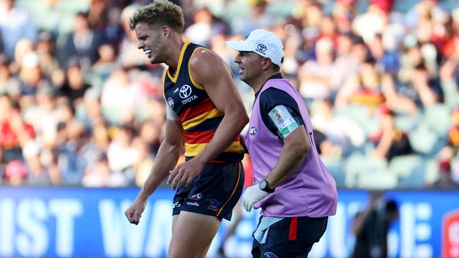 Double trouble: Mitch Hinge after his shoulder popped out a couple of times against Geelong.