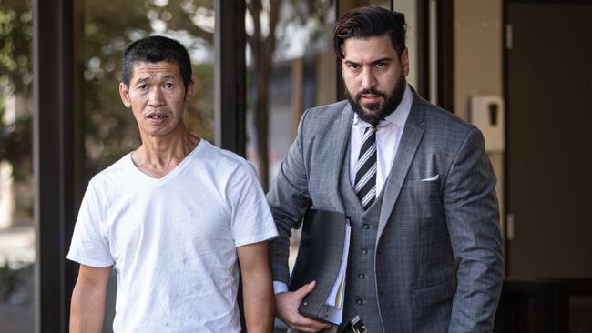 Real estate agent Alan Yin (left) pictured leaving Parramatta Local Court with his lawyer Mohammed Algalele on Wednesday. Picture: Julian Andrews