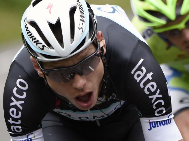 Germany's Tony Martin (L) and Italy's Alessandro De Marchi ride in a breakaway during the 170 km ninth stage of the 101st edition of the Tour de France cycling race on July 13, 2014 between Gerardmer and Mulhouse, eastern France. AFP PHOTO / ERIC FEFERBERG