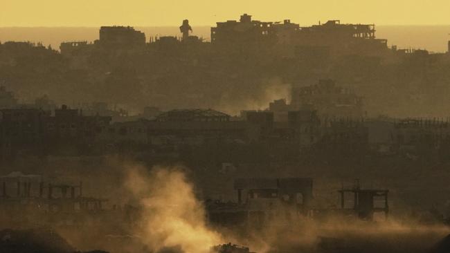 An Israeli army tank maneuvers in the Gaza Strip on Monday. Picture: AP /Ariel Schalit