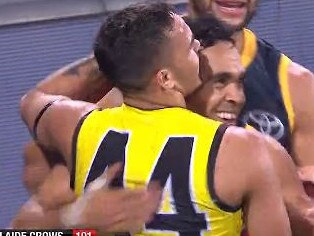 Sydney Stack hugs Eddie Betts after his miraculous goal. Picture: Channel 7