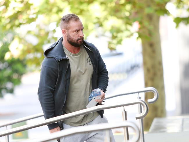 Garth Molloy, 41, of Broad Beach, arriving at Wyong Local Court for an earlier appearance where he pleaded guilty in the lower jurisdiction. (AAP Image/Sue Graham)