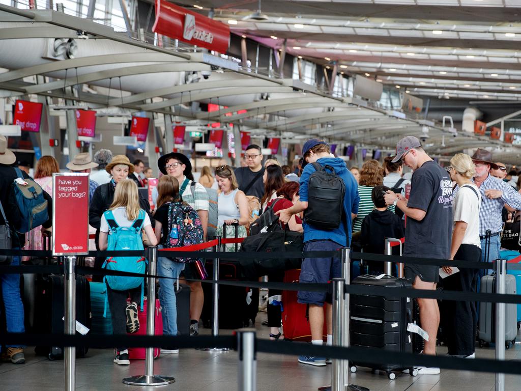 Roughly 130,000 travellers are expected to pass through Sydney Airport on Monday. Picture: NCA NewsWire / Nikki Short