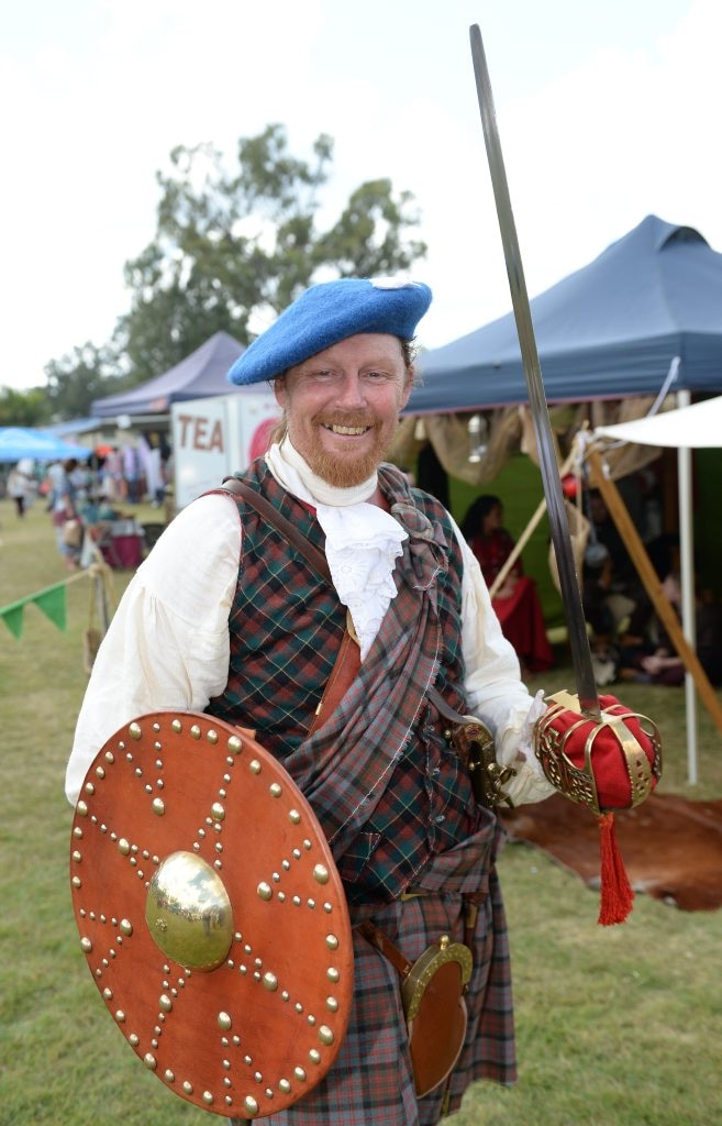 Adam Brimsley dressed as a Scotish highlander from the 1745 rebellion at the Cultural Festival held at the Heritage Village on Sunday. Photo: Chris Ison / The Morning Bulletin. Picture: Chris Ison