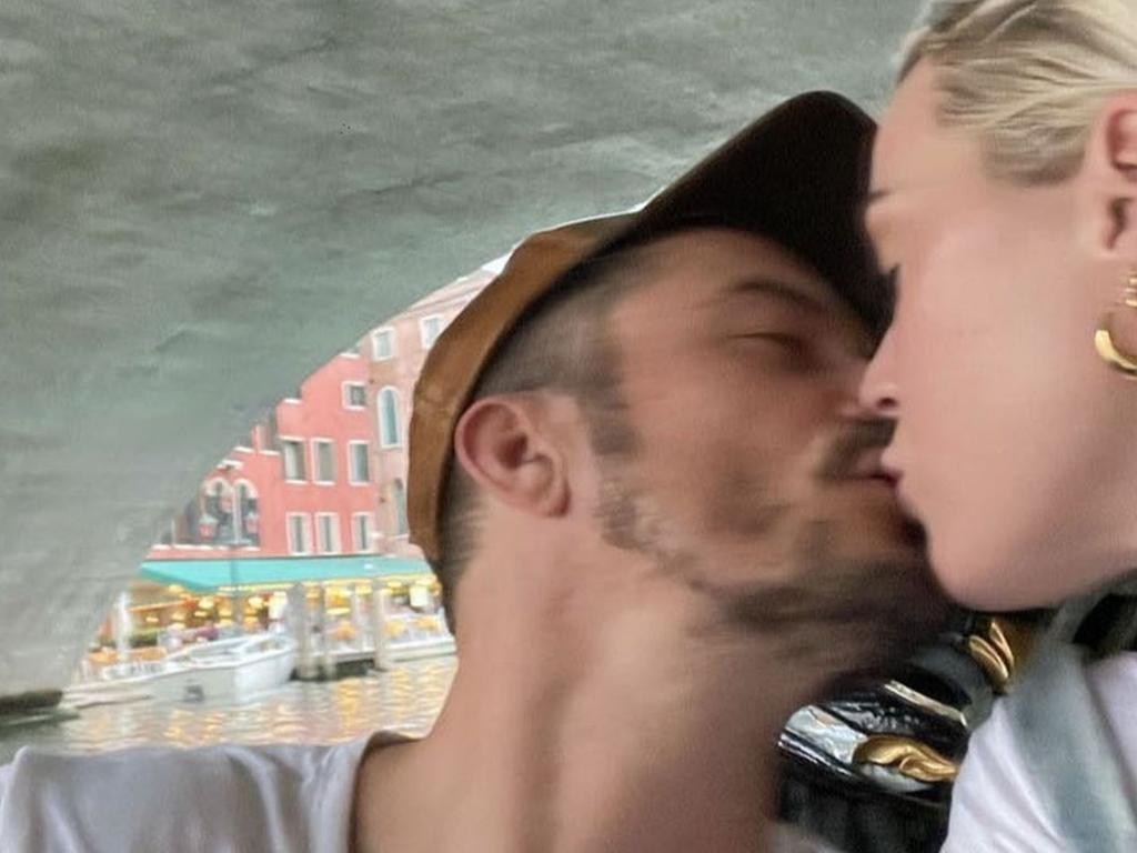 The couple shared a photo of a kiss under a bridge. Picture: Instagram