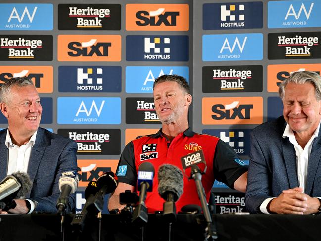 Damien Hardwick and Gold Coast’s powerbrokers at the press conference where he was unveiled as coach. Picture: Bradley Kanaris/Getty Images