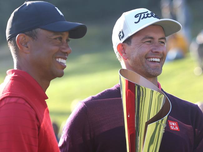 PACIFIC PALISADES, CALIFORNIA - FEBRUARY 16: Tournament host Tiger Woods and winner Adam Scott post for photos following the final round of the Genesis Invitational at the Riviera Country Club on February 16, 2020 in Pacific Palisades, California.   Katharine Lotze/Getty Images/AFP == FOR NEWSPAPERS, INTERNET, TELCOS & TELEVISION USE ONLY ==