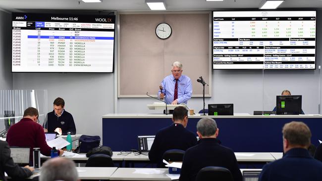 Auctioneer Eamon Timms from Fox and Lillie takes the bids during the wool auctions. Picture: Zoe Phillips