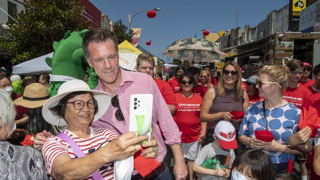 Chris Minns and his family Anna and George in Hurstville Plaza for Lunar New Year celebrations. Picture: NCA NewsWire / Simon Bullard.