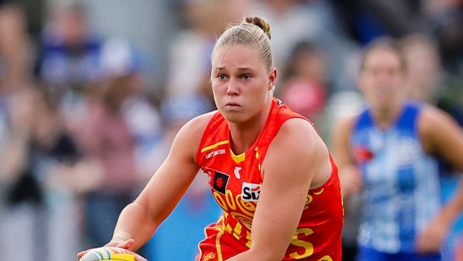 MELBOURNE, AUSTRALIA - NOVEMBER 02: Charlie Rowbottom of the Suns runs with the ball during the 2024 AFLW Round 10 match between the North Melbourne Tasmanian Kangaroos and the Gold Coast Suns at Arden Street Oval on November 02, 2024 in Melbourne, Australia. (Photo by Dylan Burns/AFL Photos via Getty Images)