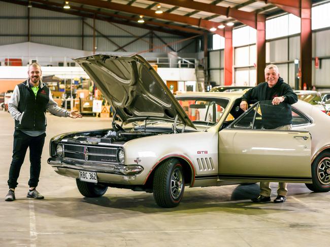 News ADV  Auction house Grays Online is selling a Holden HK Monaro - and has a price tag of $250,000 on it. Pic of Auction Manager of Motor vehicles Bobby Tuff (blue wind-cheater) and Jarrad Hannaford with the Monaro