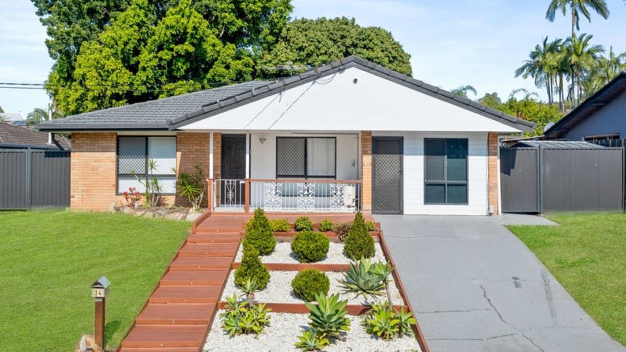 This four-bedroom house at 34 Wenlock Cres, Springwood, is on the market for offers over $939,000.