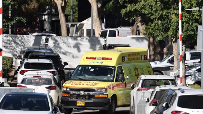 An ambulance drives behind a barrier across a street leading to Prime Minister Benjamin Netanyahu's residence in Caesarea on October 19, 2024. Picture: AFP.