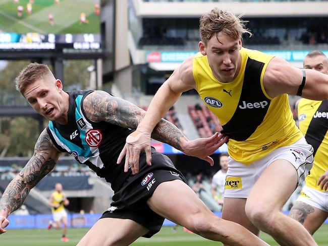 AFL - Saturday, 8th August, 2020 - Port Adelaide v Richmond at the Adelaide Oval. Hamish Hartlett and Richmond's Tom Lynch Richmond's Ivan Soldo Picture: Sarah Reed