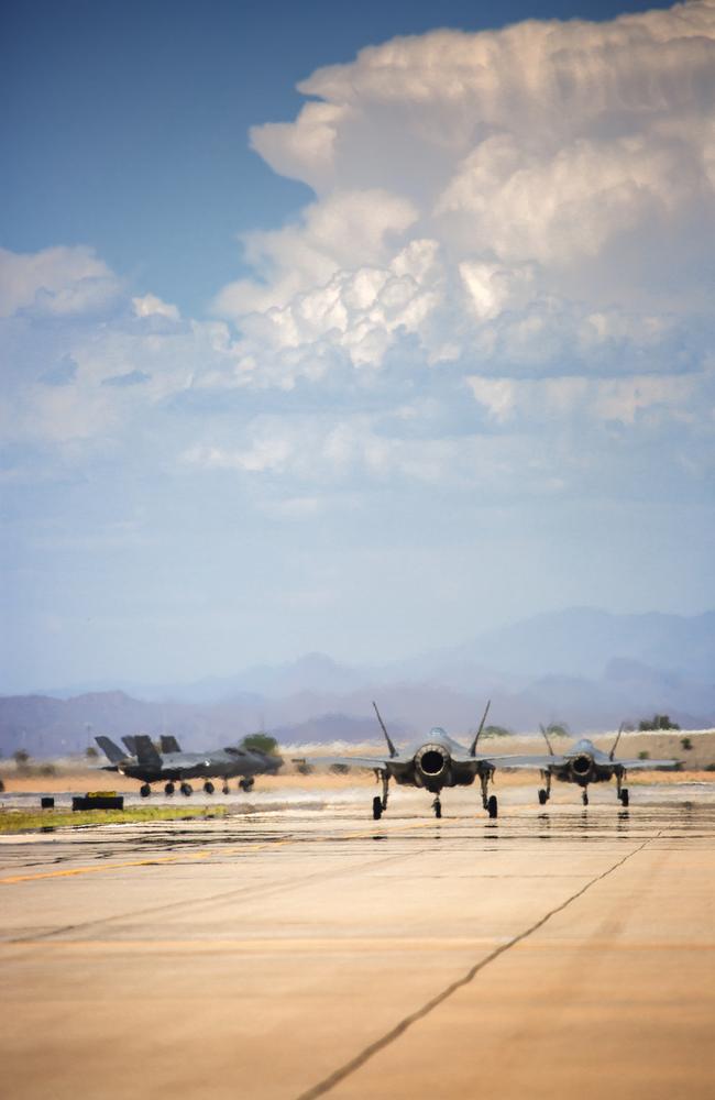 Royal Australian Air Force and United States Air Force F-35A aircraft taxi toward the runway prior to a training mission at Luke Air Force Base, Arizona. The new stealth aircraft are undergoing evaluation to determine if they live up to expectations. Picture: Defence