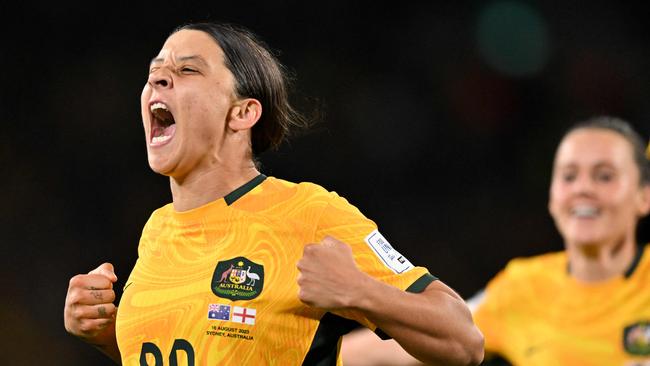 Australia's forward #20 Sam Kerr celebrates scoring her team's first goal during the Australia and New Zealand 2023 Women's World Cup semi-final football match between Australia and England at Stadium Australia in Sydney on August 16, 2023. (Photo by Izhar KHAN / AFP)