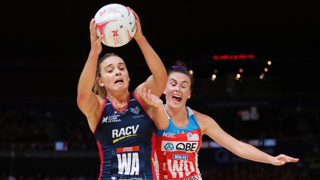 Liz Watson of the Vixens and Maddy Proud of the Swifts during their clash in Sydney. Pic: Brett Costello
