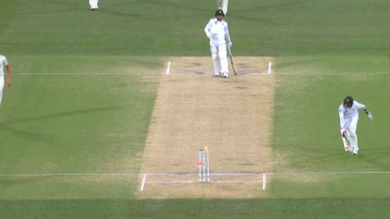 Pat Cummins runs out Mohammad Abbas.