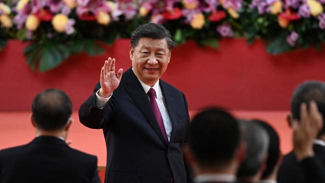 Xi Jinping waves after a ceremony in Hong Kong. Picture: AFP.