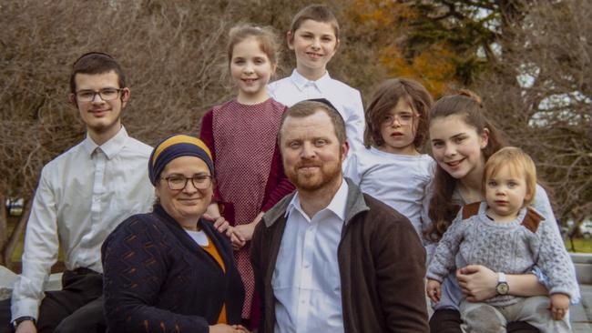 Adina and Vadim Chelom with their children Issa, 2, Nehama, 6, Gittel, 9, Tolik, 10, Keren, 13 and Moshe, 16 at home in St Kilda East. Picture: Andy Brownbill