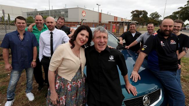 Lucinda Gregory and Mark Bloomfield with fellow Holden workers. Picture: Kelly Barnes