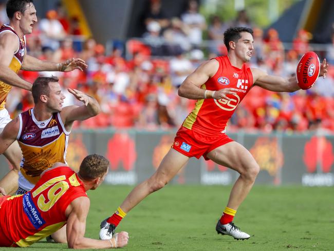 Brayden Fiorini of the Suns with the ball during the Round 6 AFL match between the Gold Coast Suns and the Brisbane Lions at Metricon Stadium on the Gold Coast, Saturday, April 27, 2019. (AAP Image/Glenn Hunt)