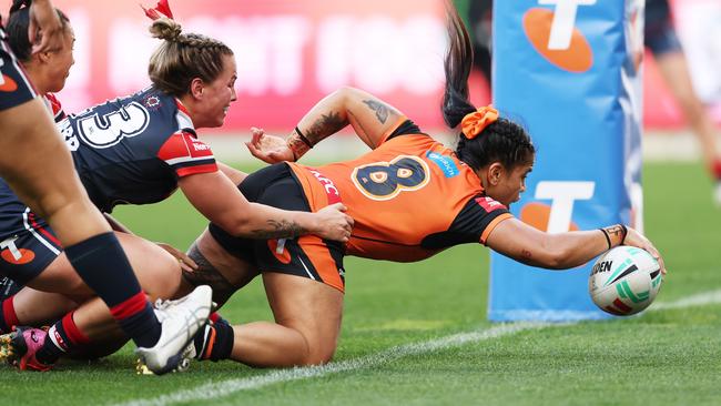 Sarah Togatuki drives over to score for the Tigers. Picture: Getty Images