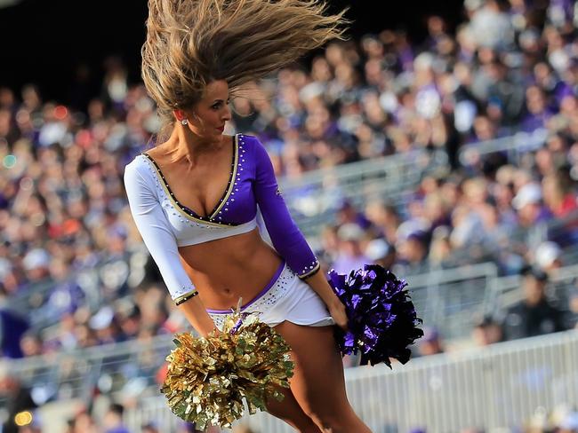 A Ravens cheerleader in full flight earlier in the game.